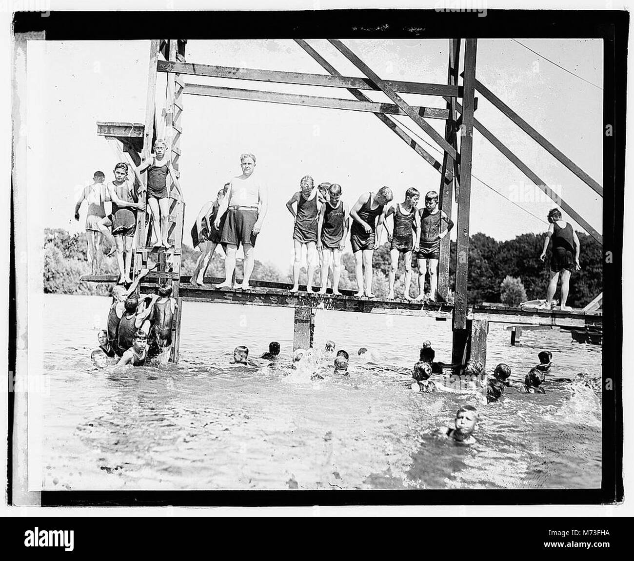 A photograph of Davis swimming in Moosehead Lake on July 22, 1921, capturing a moment of outdoor recreation in a natural setting. Stock Photo