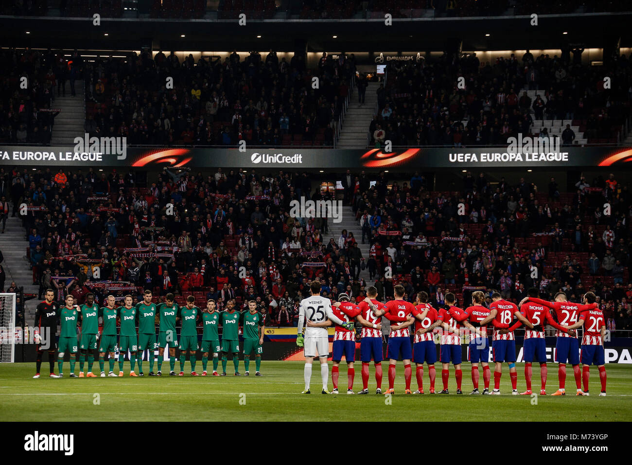 Madrid, Spain. 8th Mar, 2018. Players hold a minute of silence at the Butarque in memory of the Davide Astori UEFA Europa League match between Atletico de Madrid vs Lokomotiv Moscu at the Wanda Metropolitano stadium in Madrid, Spain, March 8, 2018. Credit: Gtres Información más Comuniación on line, S.L./Alamy Live News Stock Photo