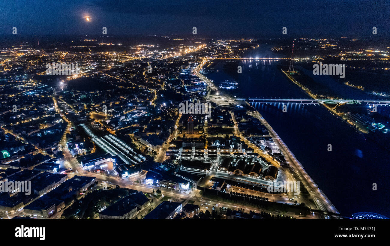 Riga city Night time bridge Autumn Drone flight lights Stock Photo - Alamy