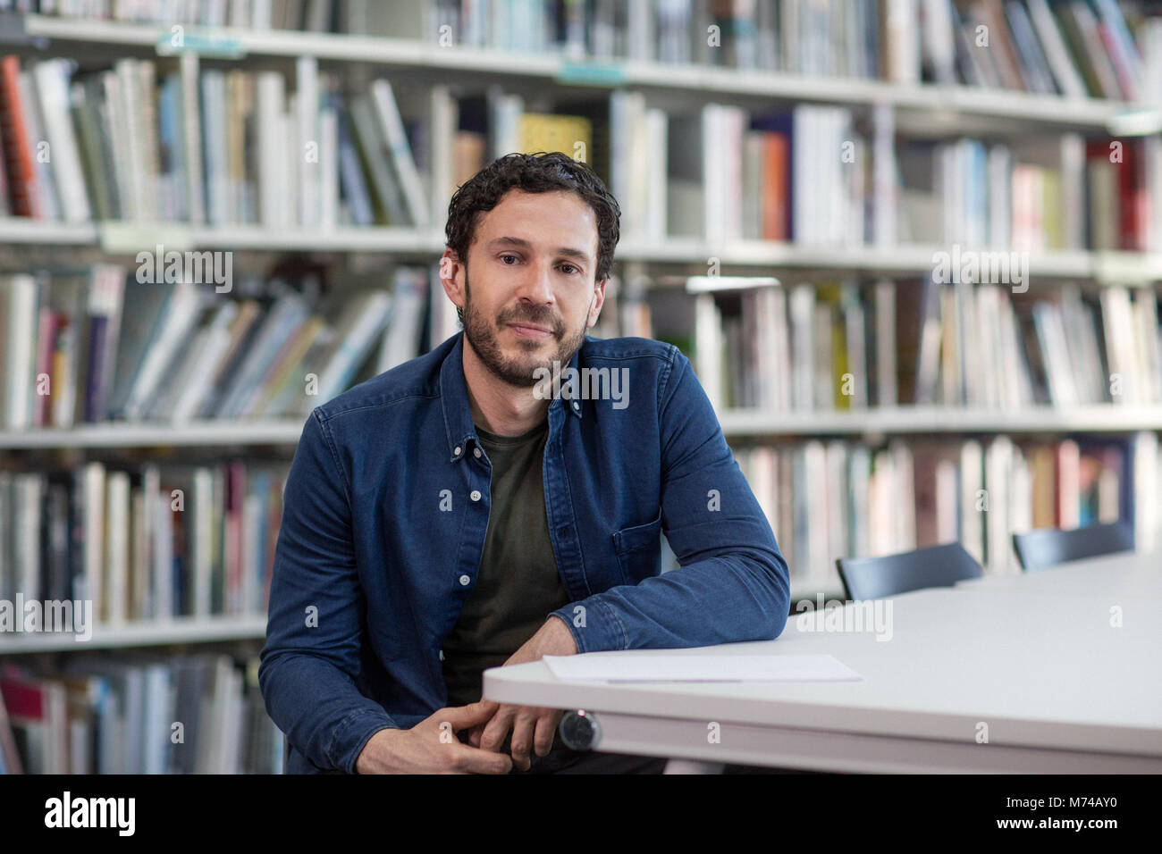 Portrait of mature student in college library Stock Photo