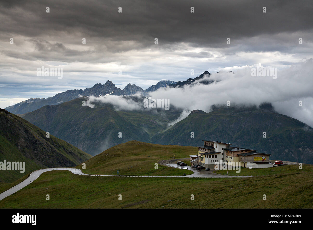 Restaurant high in the Austrian Alps on a stormy day Stock Photo