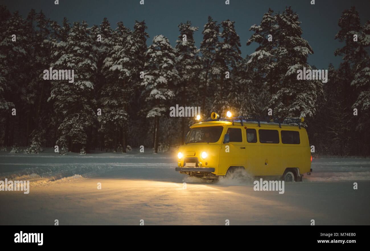 vintage ussr yellow van winter snow forest Stock Photo