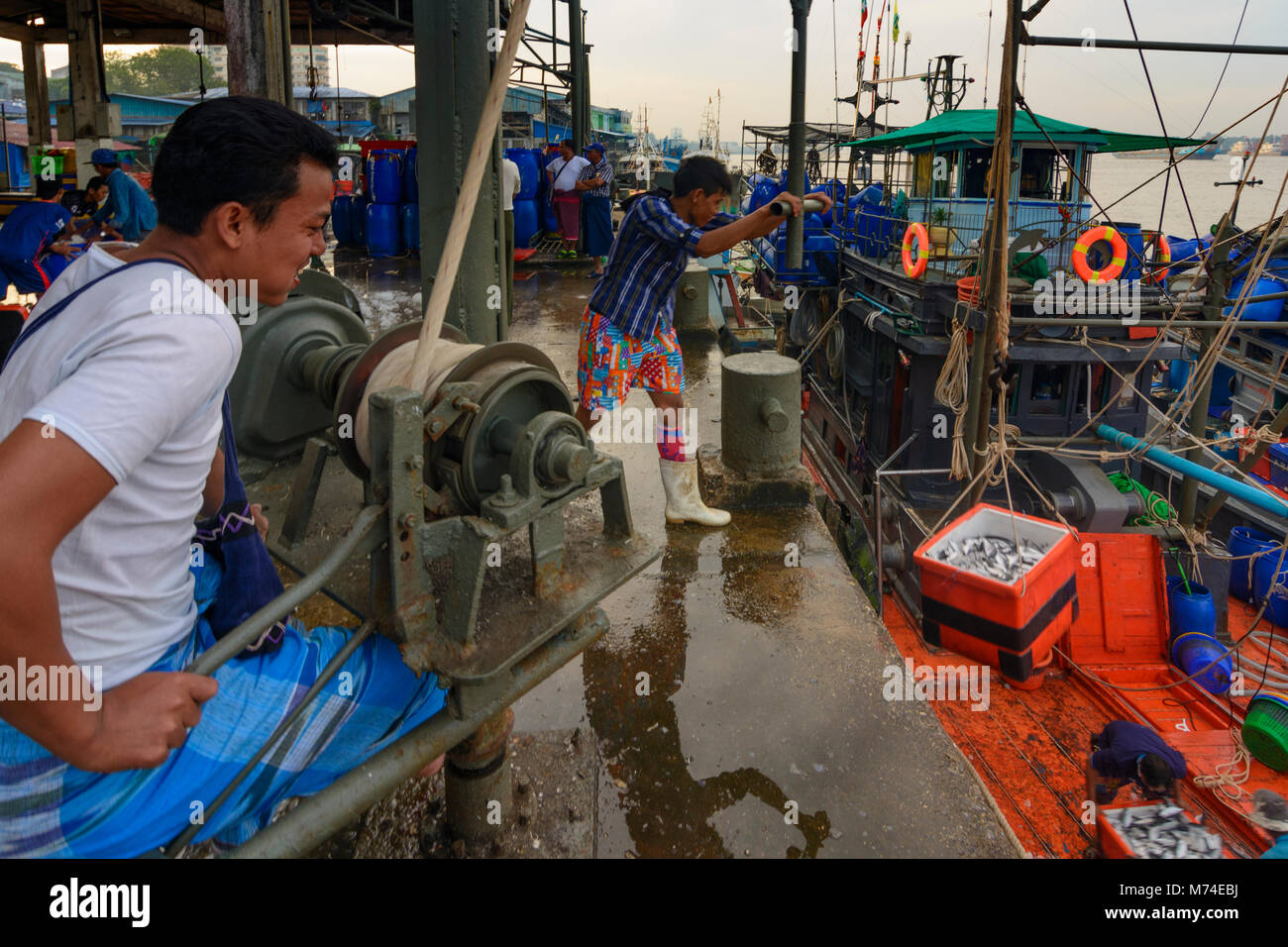 Yangon (Rangoon) San Pya Fish Market unloading fishing ship with