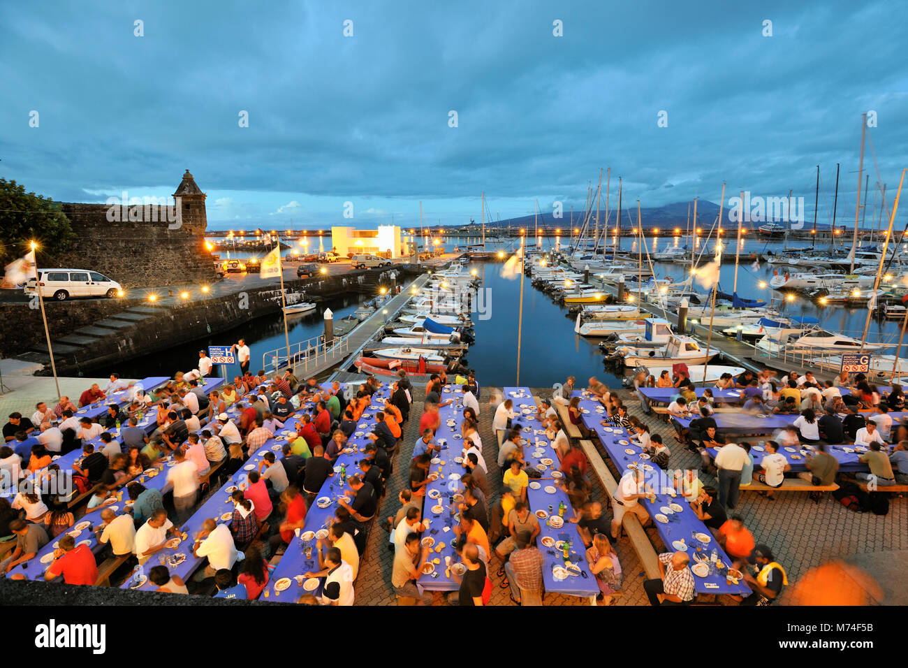 Dinner with all the sailors of the regattas during the Sea Week festival, at the Marina and Clube Naval da Horta. Faial, Azores islands, Portugal Stock Photo