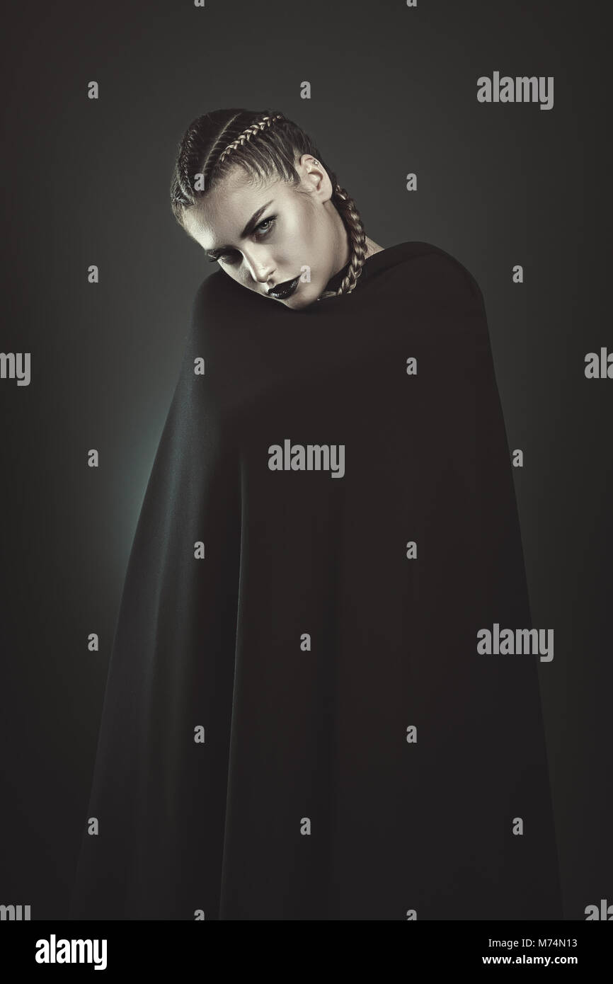 Black cloak hi-res stock photography and images - Alamy