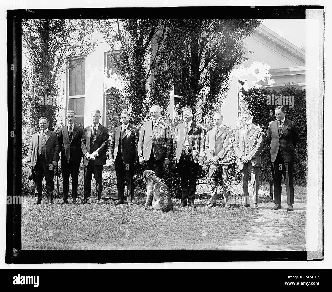President Warren G. Harding is seen with members of the Rainbow Division on April 20, 1921. The photo captures the significance of the Rainbow Division in American military history, particularly after World War I. Stock Photo