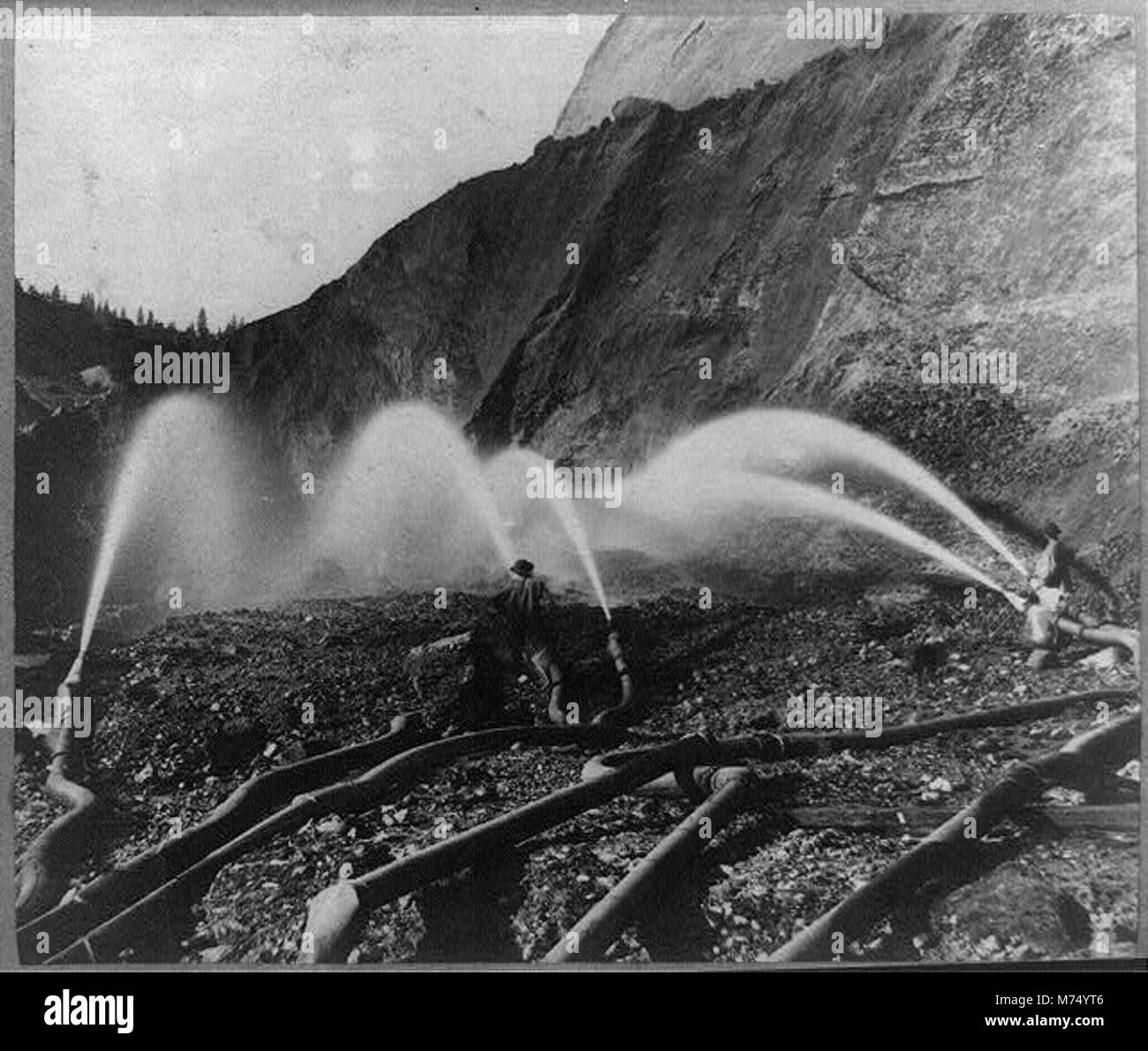 Hydraulic mining behind the pipes in the Kennebec Claim, Birchville