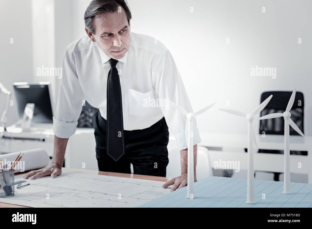 Confident male person being deep in thoughts Stock Photo Alamy