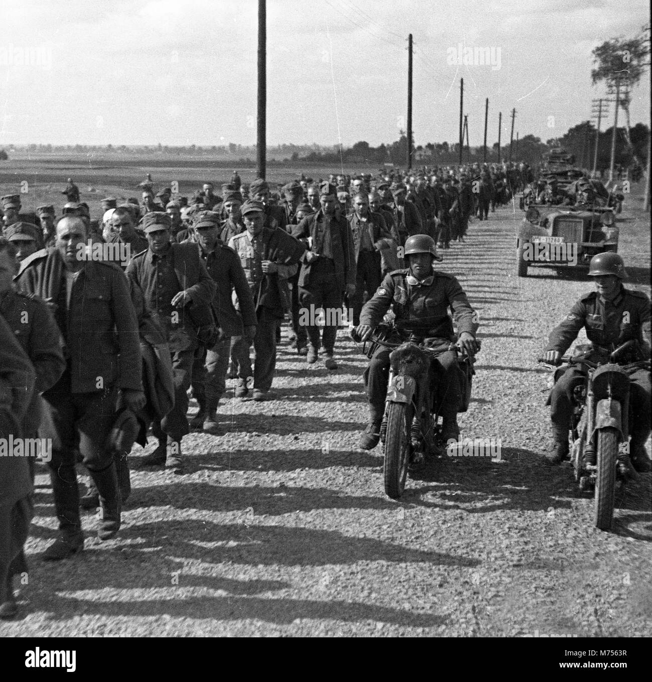 1939 WW2 Polish prisoners of war escorted by German soldiers near Lviv/Lwow during German invasion of Poland. Stock Photo