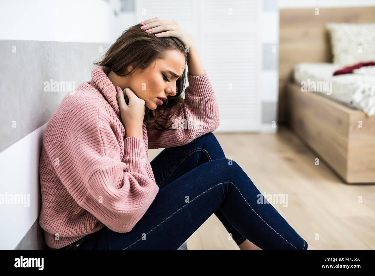 beautiful woman feeling bad and getting headache painful sitting on