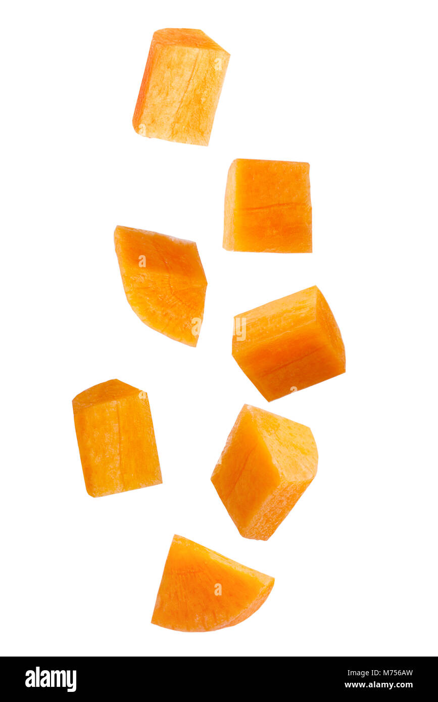 Isolated falling vegetables. Falling sliced carrot isolated on white