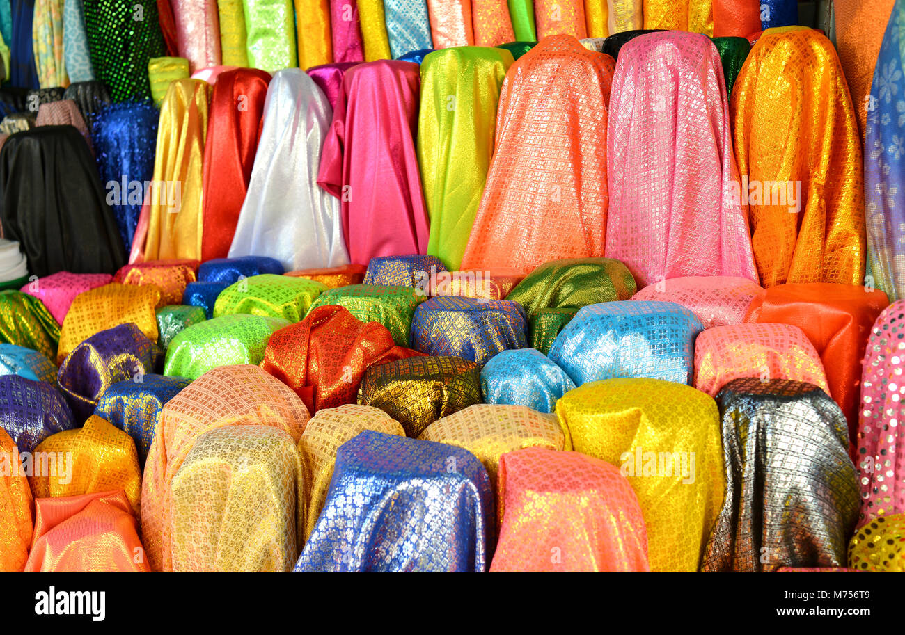 colorful fabric roll for sale at market Stock Photo Alamy