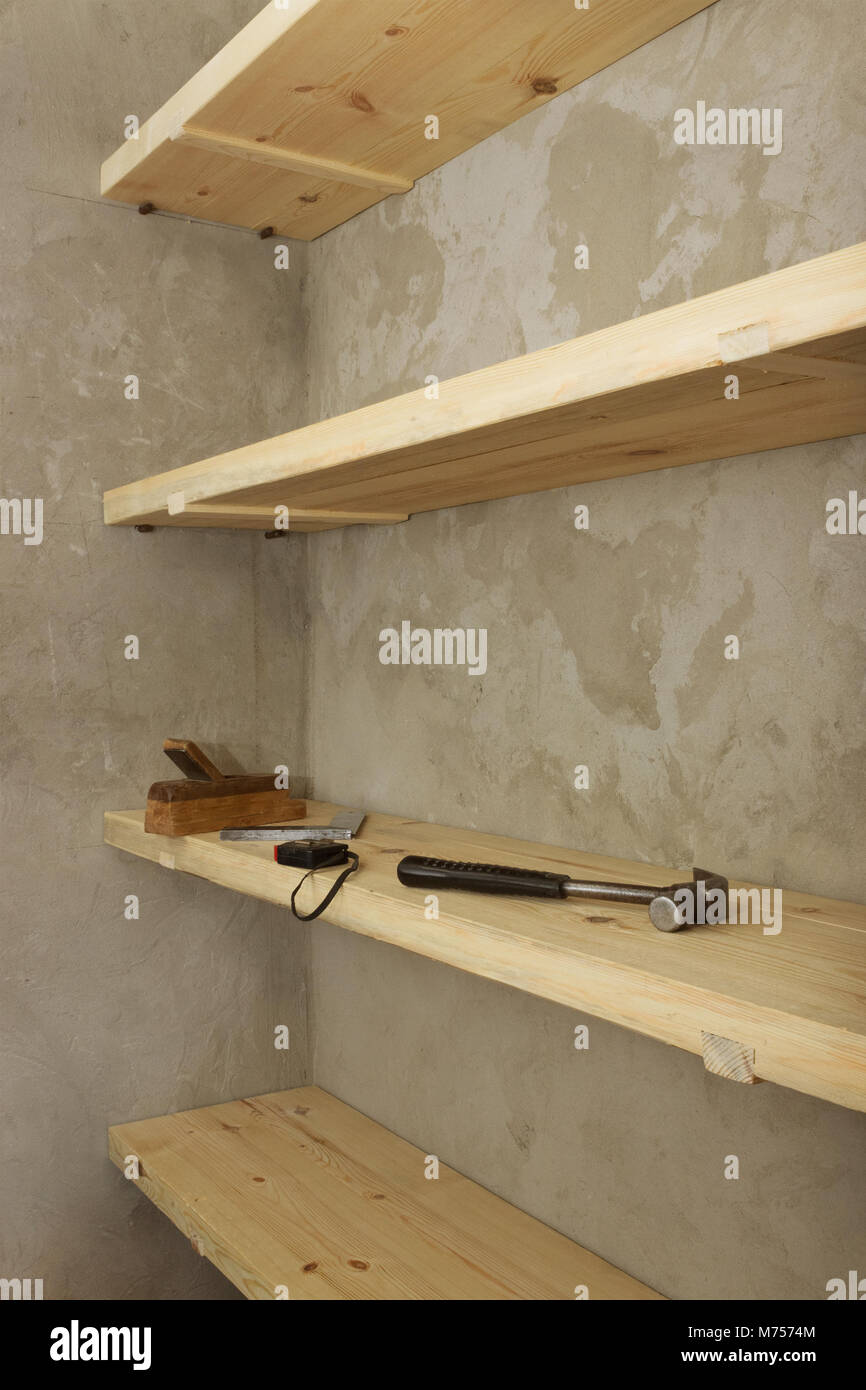 Solid shelves of wood that you just made in the pantry Stock Photo Alamy