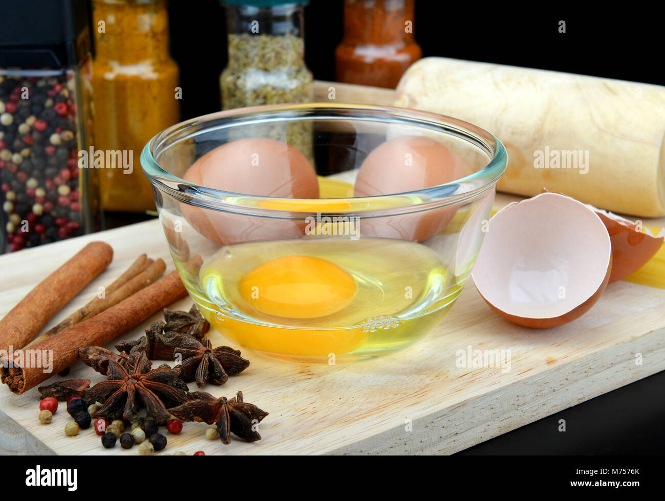 raw egg with spices set in the kitchen objects Stock Photo