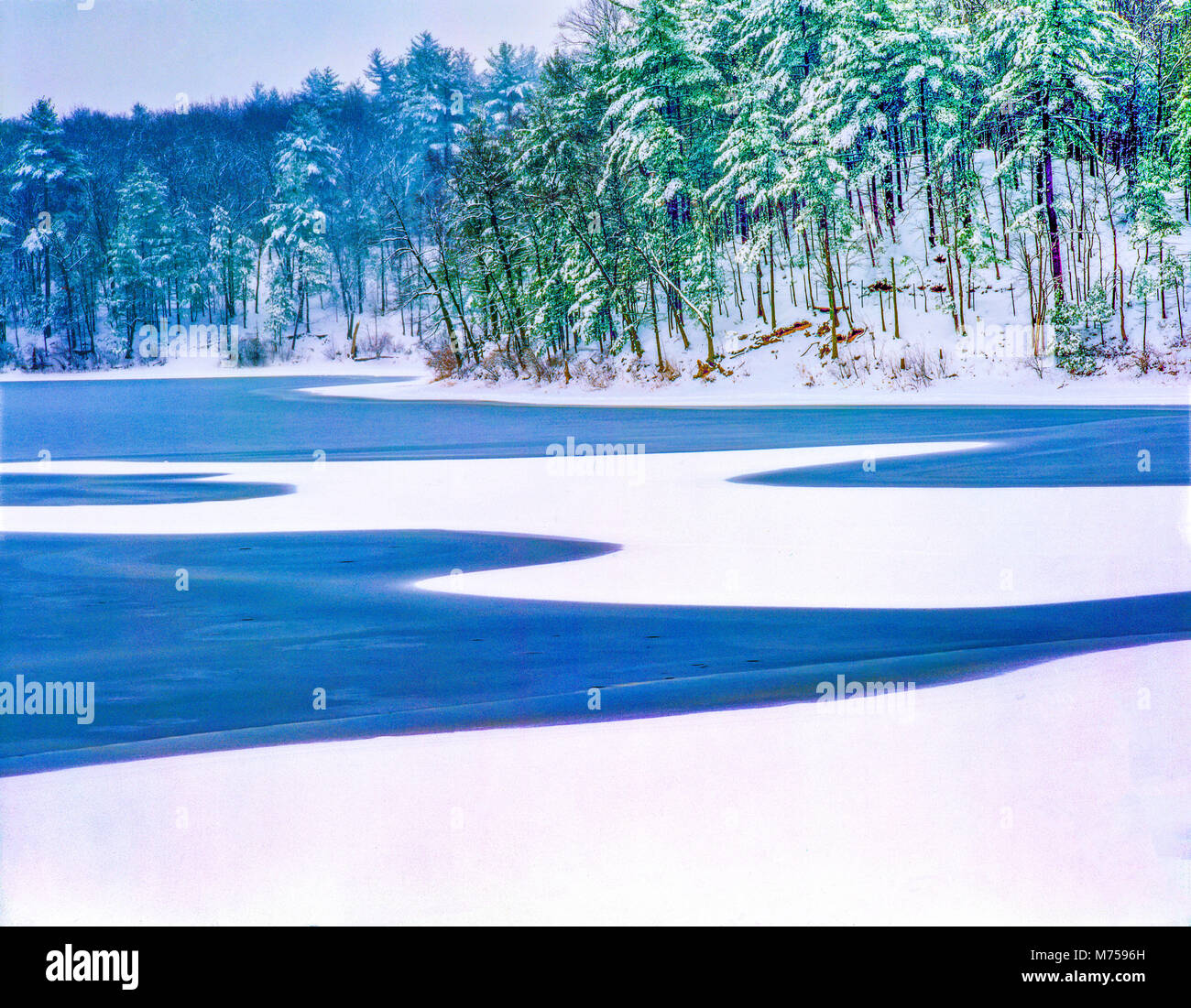 Walden pond in winter, Walden Pond State Reservation, Massachusetts, Famous home of Henry David Thoreau Stock Photo