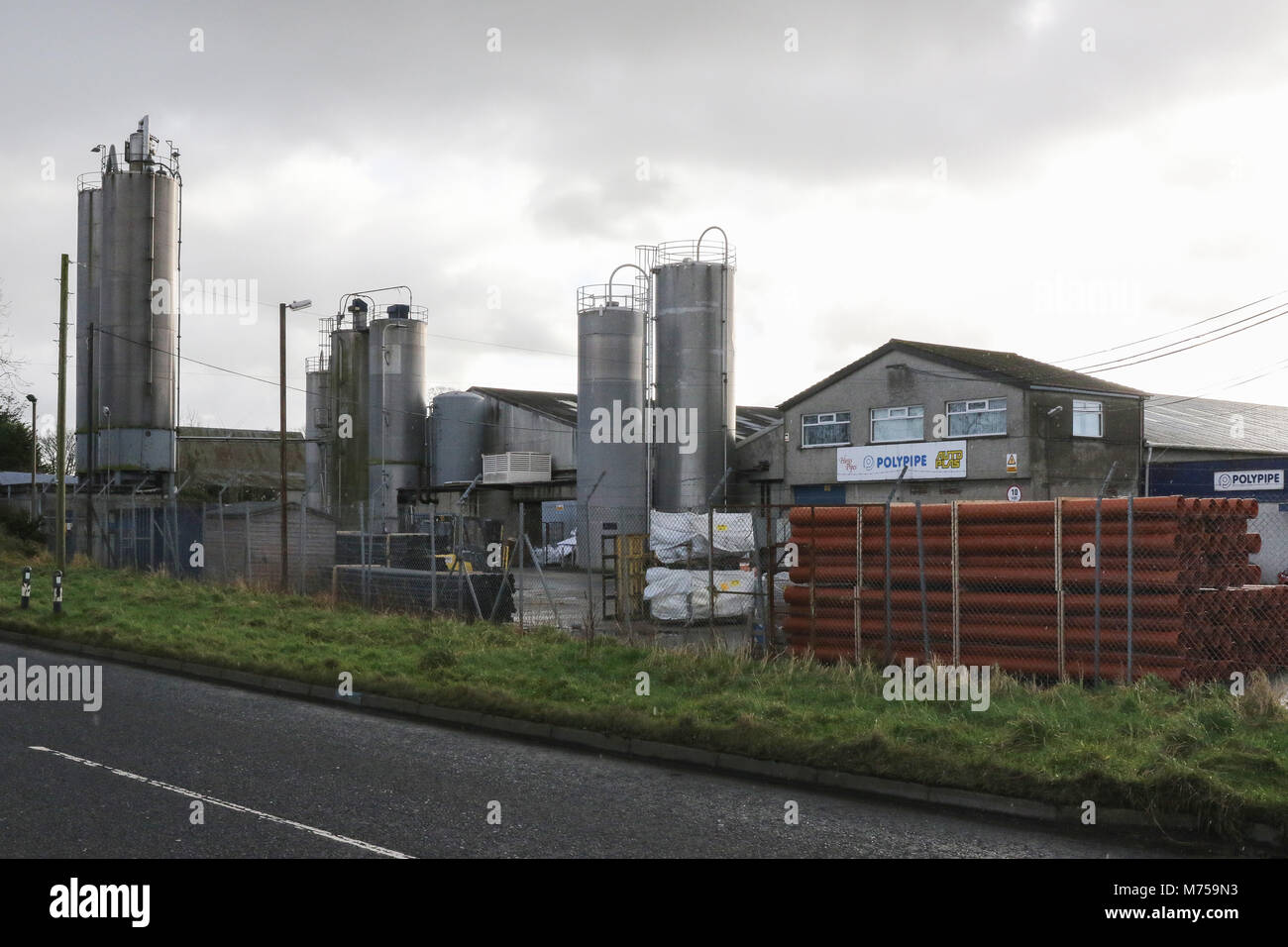 Brown plastic pipes outside Polypipe premises on the Dromore Road