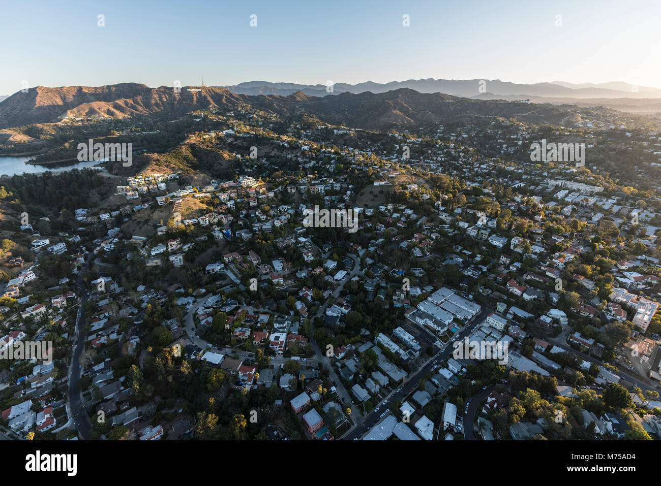 Aerial morning view of hillside homes in the Hollywood Hills neighborhood near Griffith Park in Los Angeles California. Stock Photo
