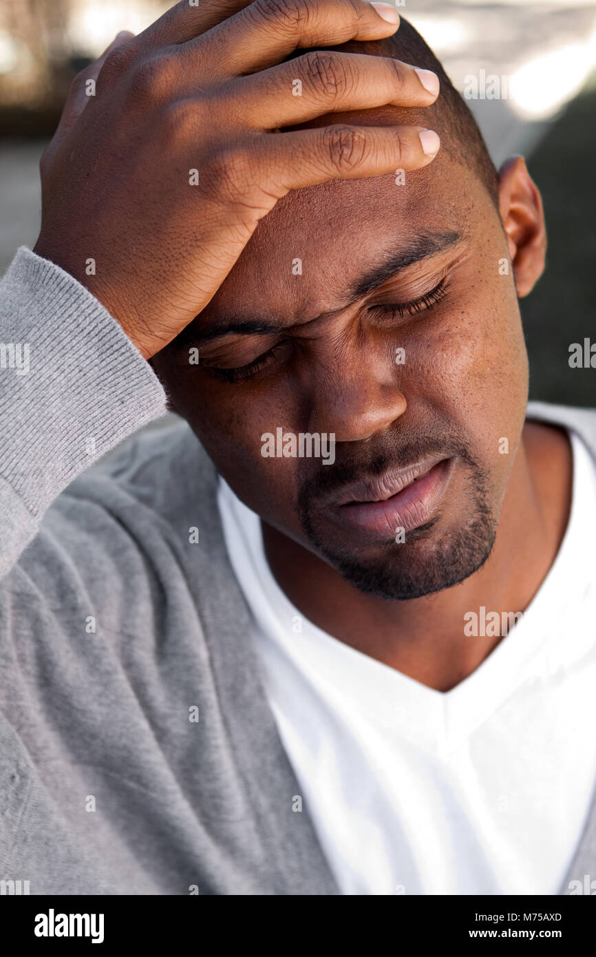 Sad teenager african hi-res stock photography and images - Alamy