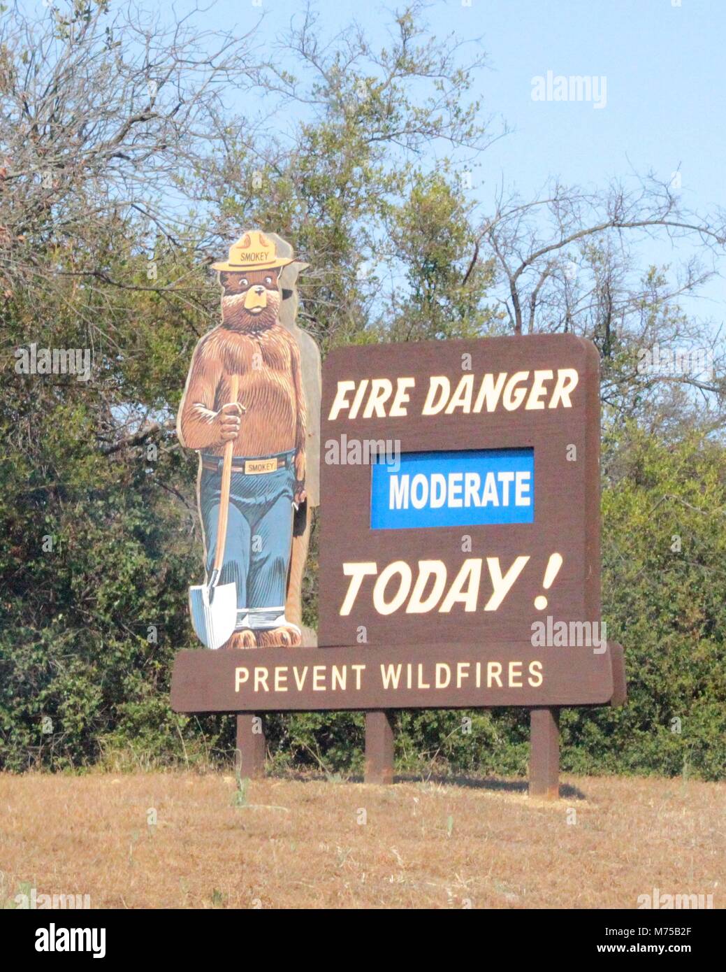 Smokey the bear billboard alert information sign hires stock