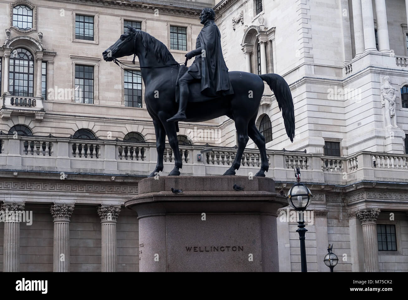 Equestrian statue of the Duke of Wellington, sculpted by Francis Leggatt Chantrey and Herbert William Weekes.  Located at Royal Exchange, London Stock Photo