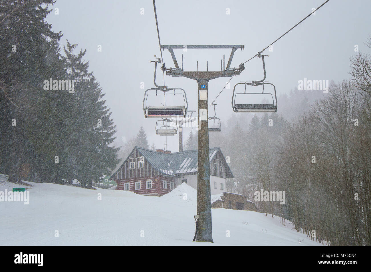 Snow sorm of the hill in the ski resort in Krkonose Stock Photo