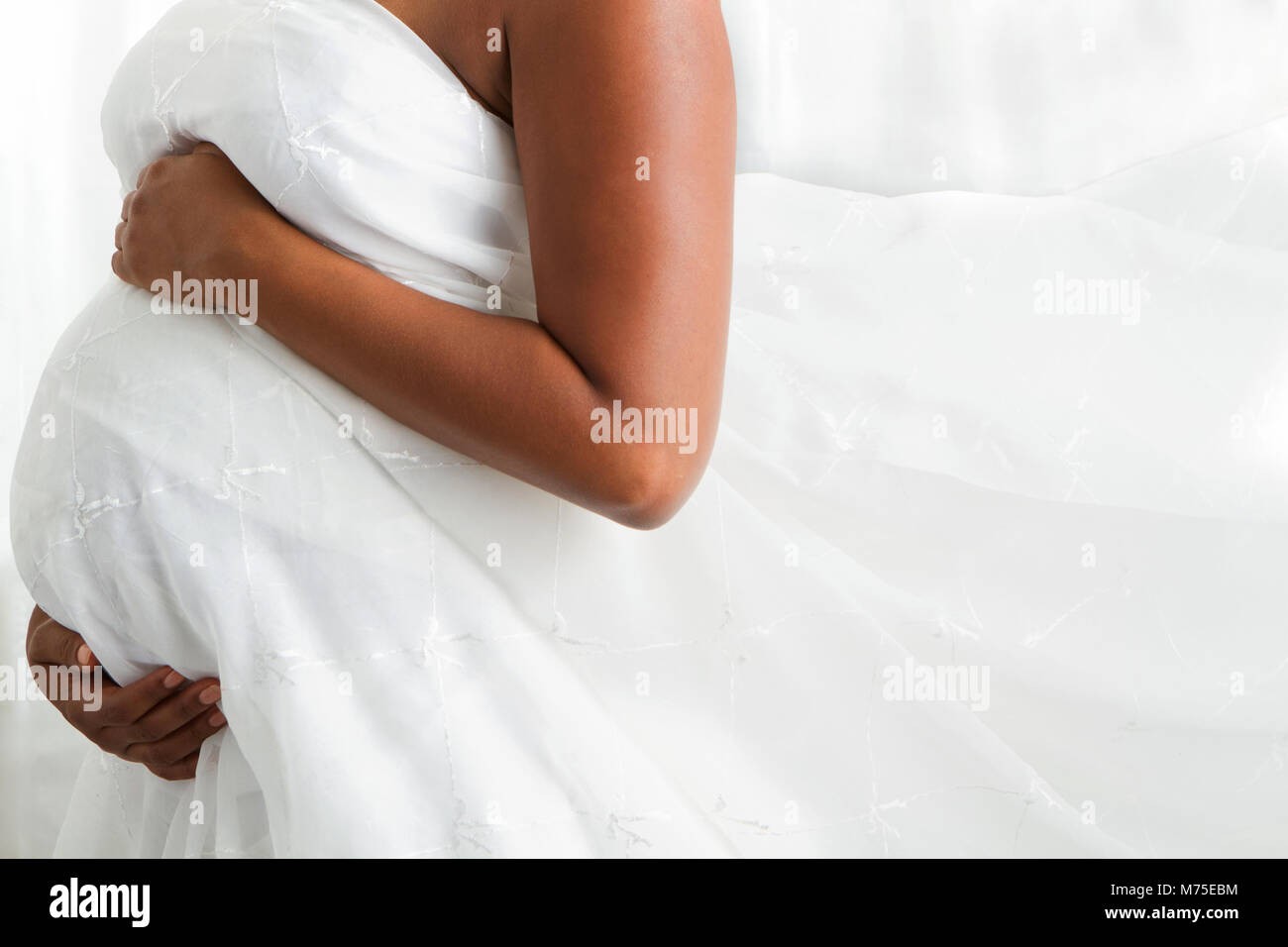 Pregnant woman's stomach Stock Photo Alamy