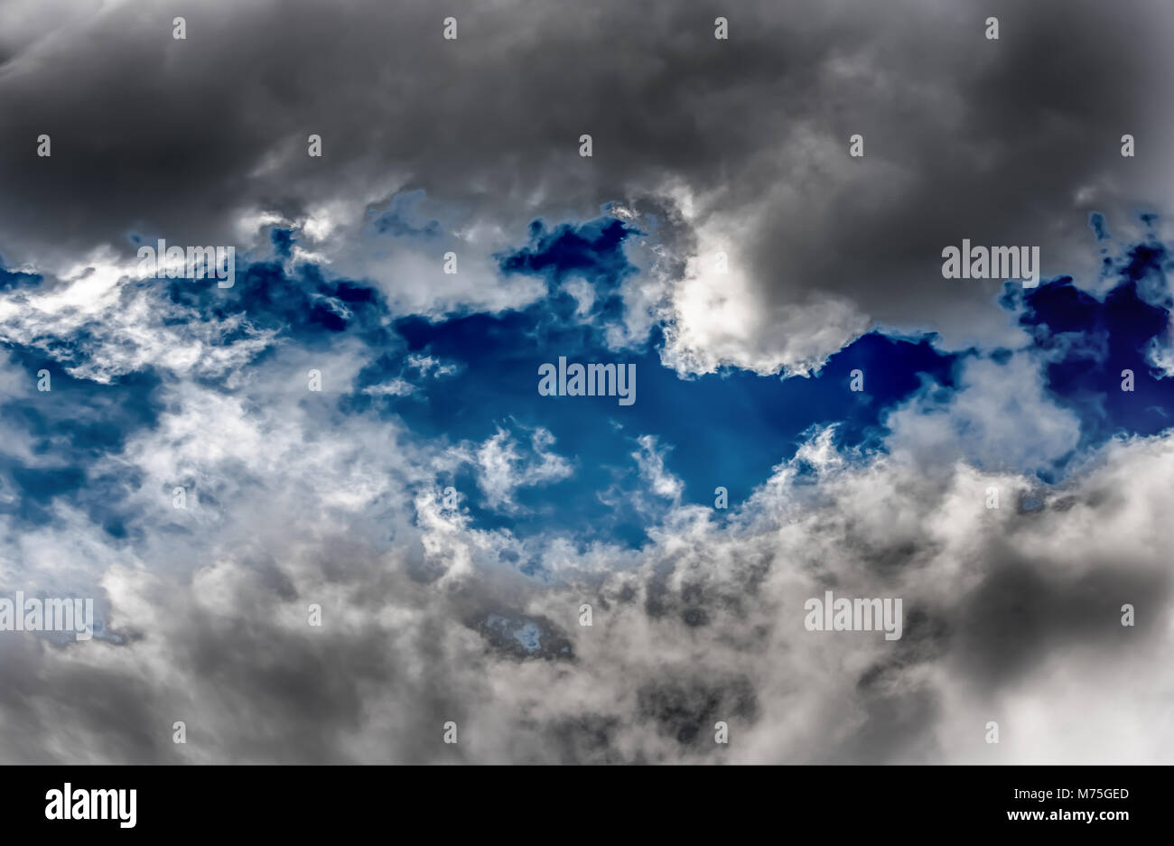 Cloudy blue sky abstract background Stock Photo - Alamy