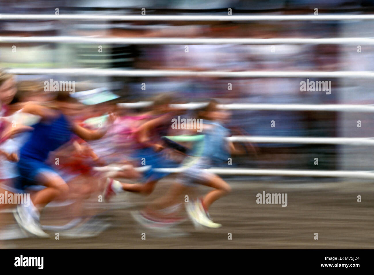 Children running in foot race at a State Fair Stock Photo