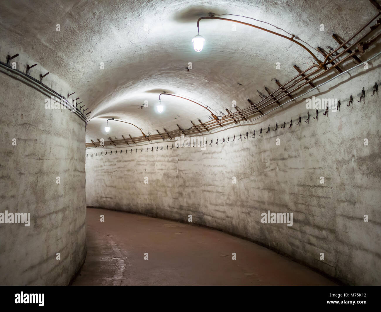 An underground tunnel leading to the object 820 RTB, an underground museum complex Balaklava, Crimea Stock Photo