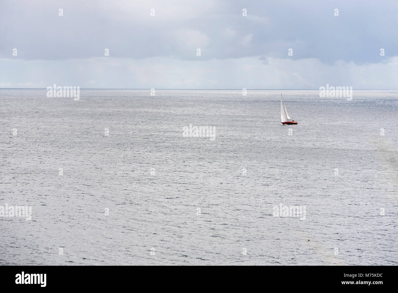 Lone sailors on Celtic Sea Stock Photo