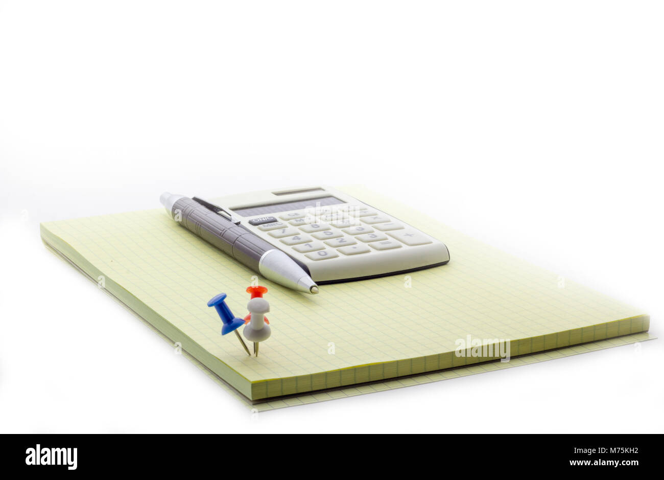 Calculator pen and notebook on white background Stock Photo - Alamy