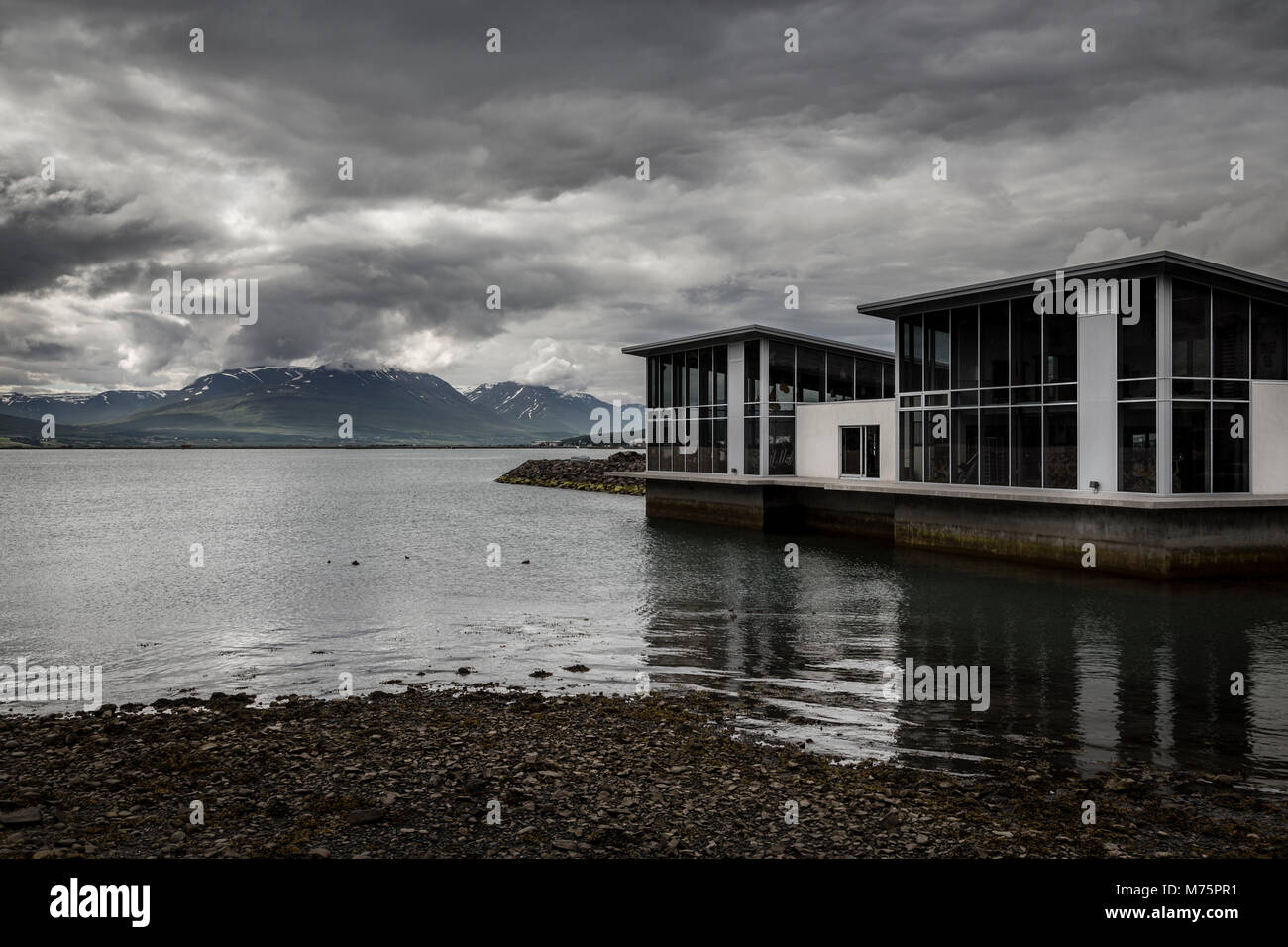 Modern building by the fjord at Akureyri, Iceland Stock Photo