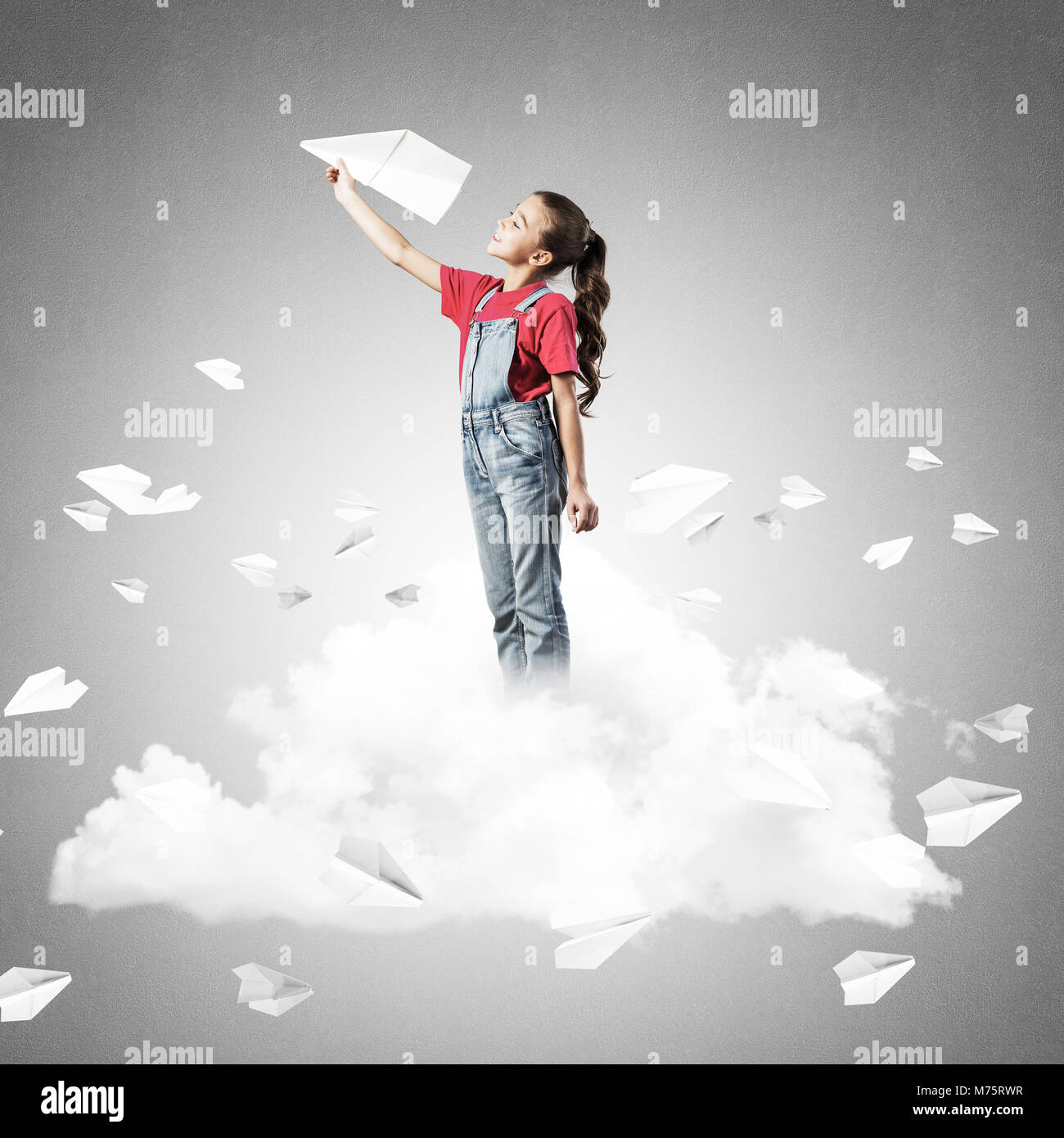 Cute kid girl on cloud and paper planes flying around Stock Photo - Alamy