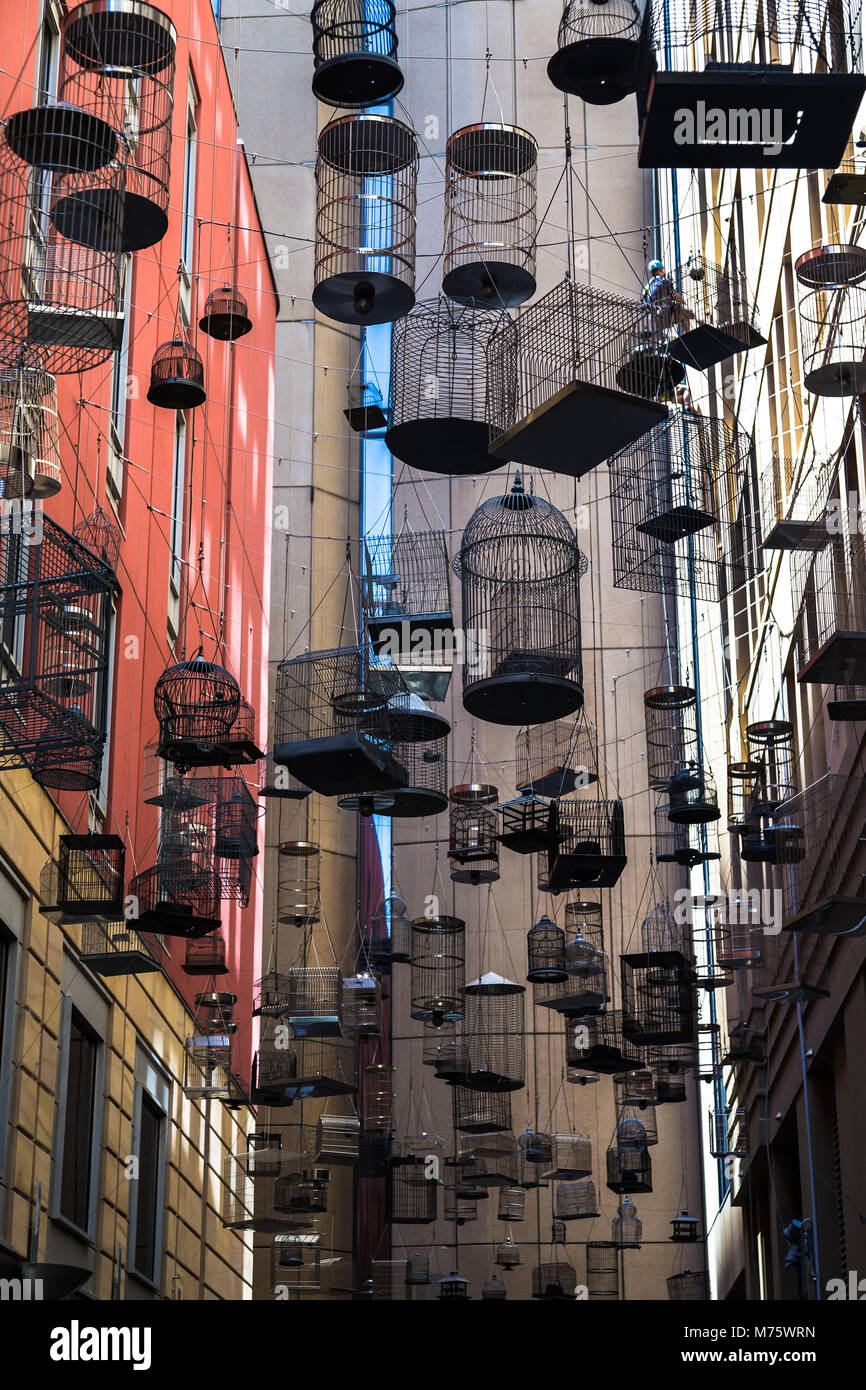 An art installation of 50 hanging cages, titled Forgotten Songs. It comenorates the songs of fifty birds once heard in Central Sydney. Stock Photo