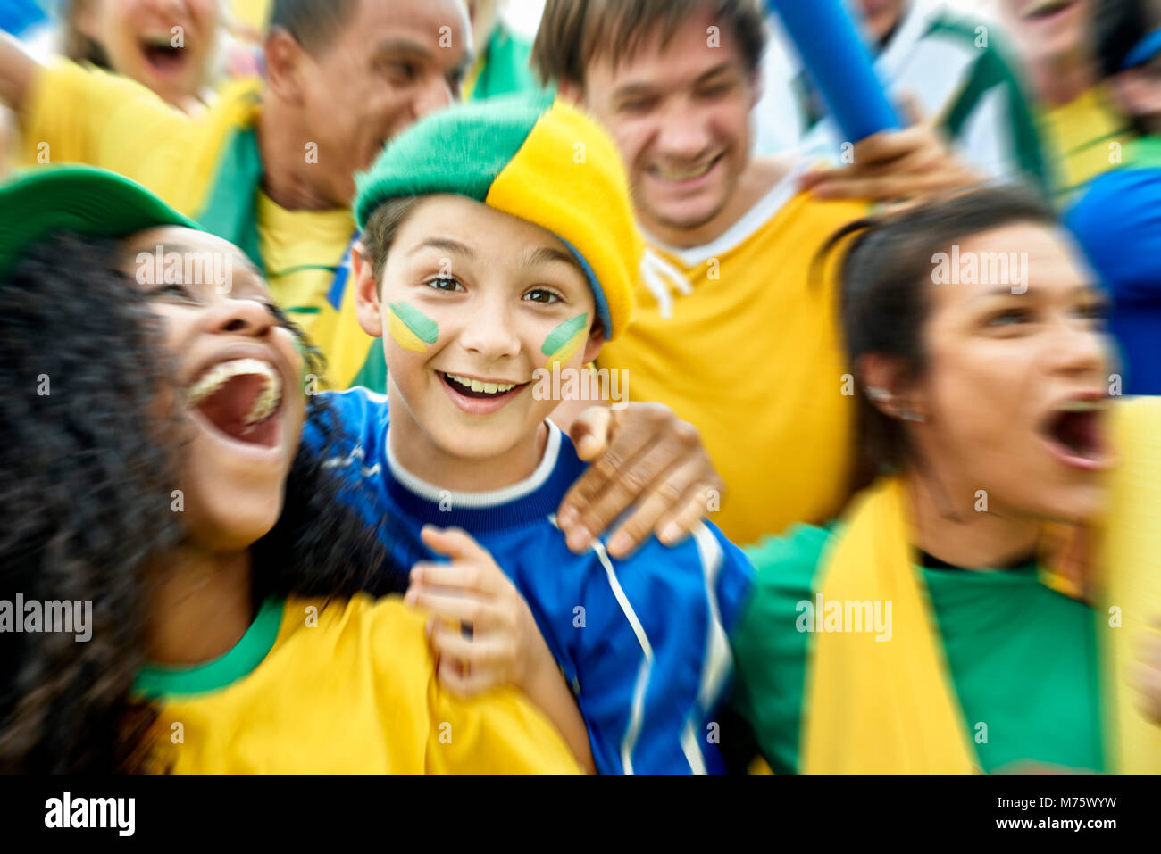Brazilian football fans watching football match Stock Photo