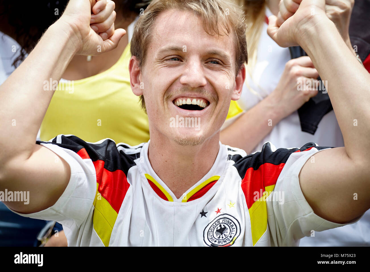 German football fan cheering at match Stock Photo
