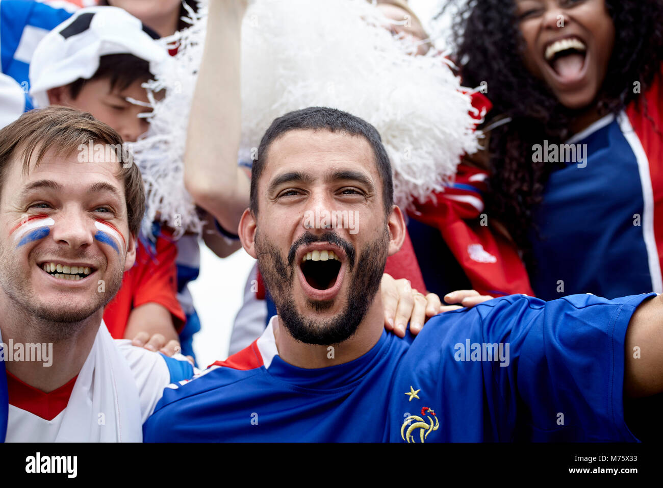 French football fans cheering at match Stock Photo Alamy