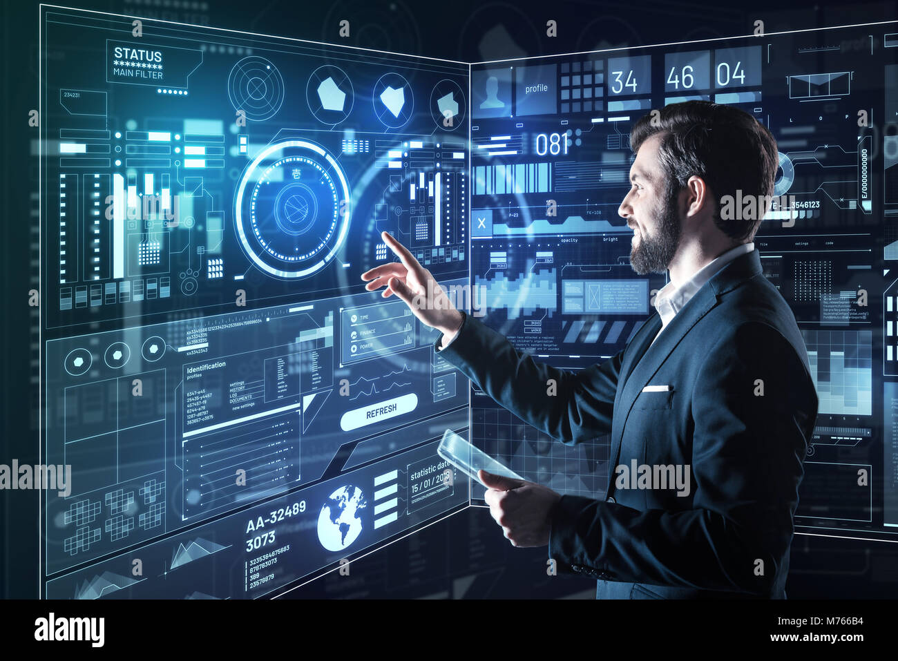Positive Computer Programming Positive programmer smiling while pointing to the diagrams Stock Photo ...