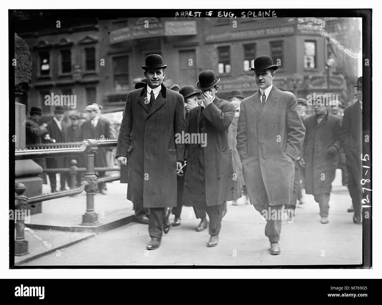 A photograph depicting the arrest of Eugene Splaine, capturing a ...