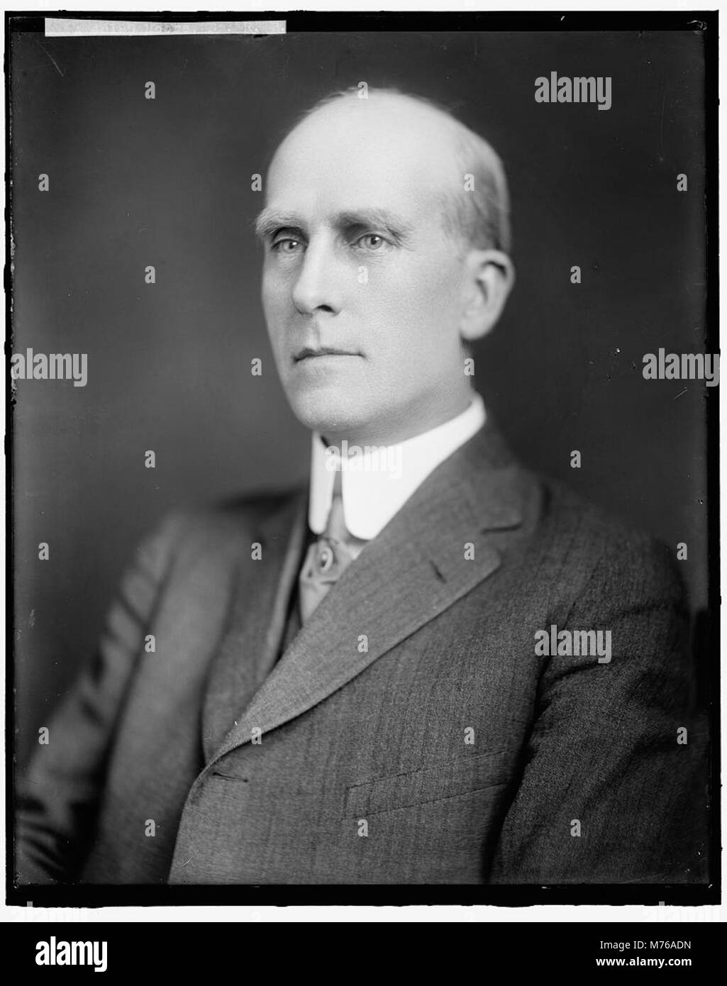 Dr. R.B. Moore, a medical professional, is depicted in this photograph ...