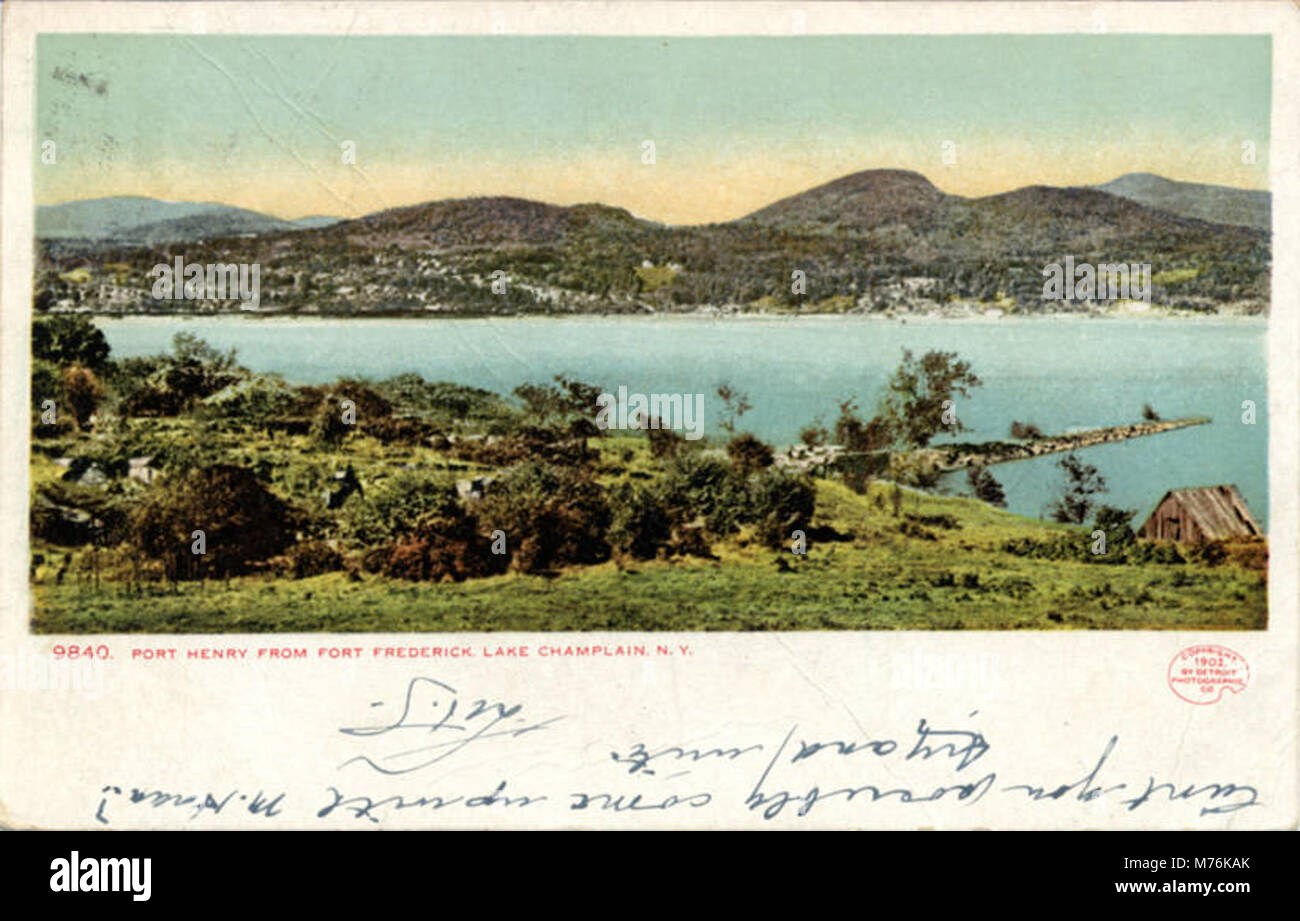 A scenic view of Port Henry from Fort Frederick, offering a picturesque perspective of the town and surrounding landscape. The image highlights the historical military site and its importance. Stock Photo