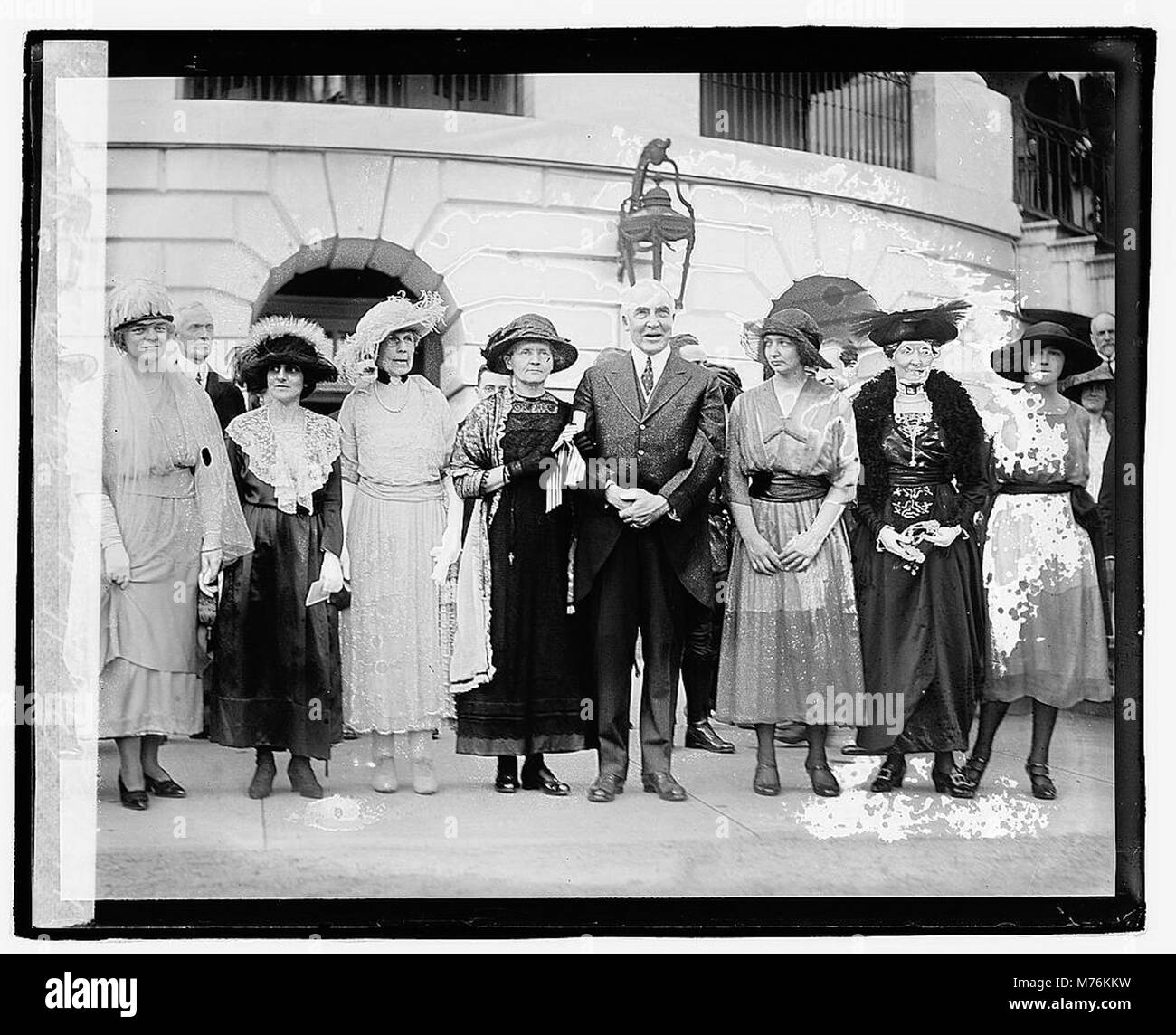 A photograph of President Warren G. Harding with Marie Curie, taken on May 20, 1921, capturing their historic meeting, blending science and politics. Stock Photo