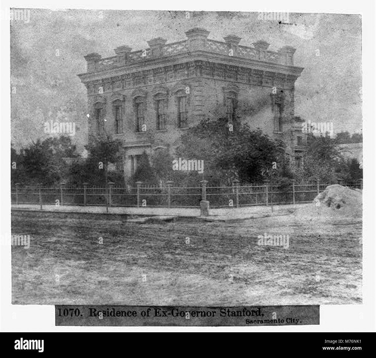 A photograph of the residence of former California Governor Leland Stanford in Sacramento. The image captures the architecture and grandeur of the estate during the late 19th century. Stock Photo