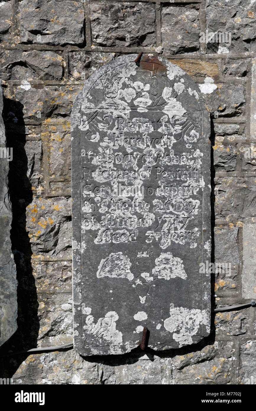Slate memorial plaque on the outside of  St Rhidian and St Illtyd church at   Llanrhidian on the Gower peninsular in Wales. Stock Photo