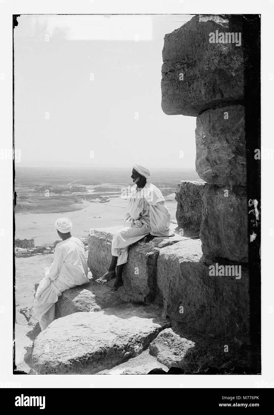 The image shows the pyramids of Giza in the Nile Valley, with a view ...