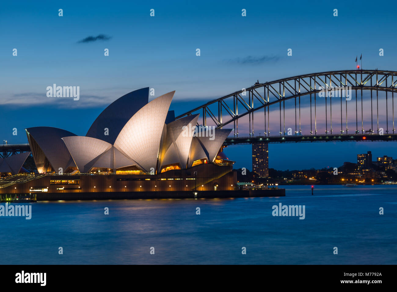 Sydney Opera House, UNESCO World Heritage Site, and Harbour Bridge after sunset, Sydney, New South Wales, Australia, Pacific Stock Photo