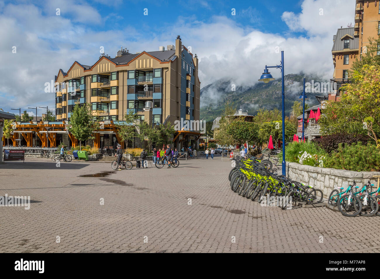 Cycles and shops aligning Skiers Plaza, Whistler Village, British Columbia, Canada, North America Stock Photo