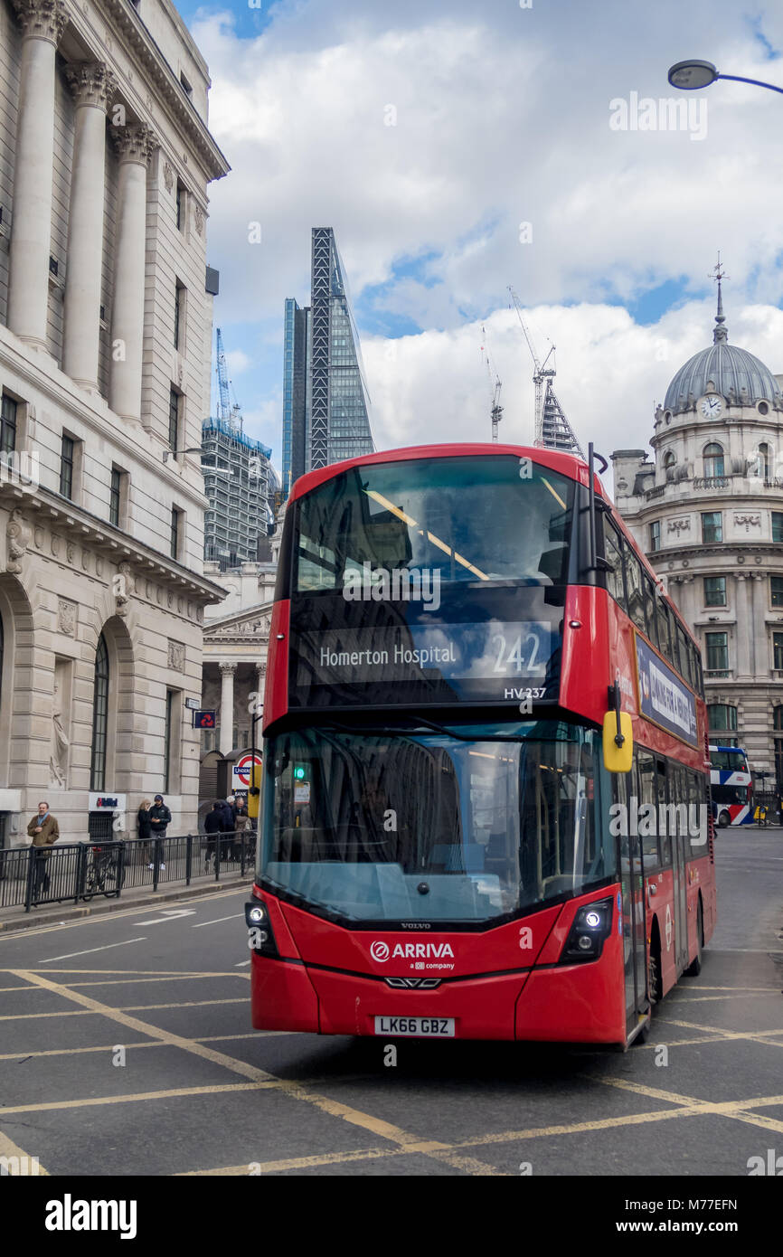 A London bus driving along Poultry, London Stock Photo