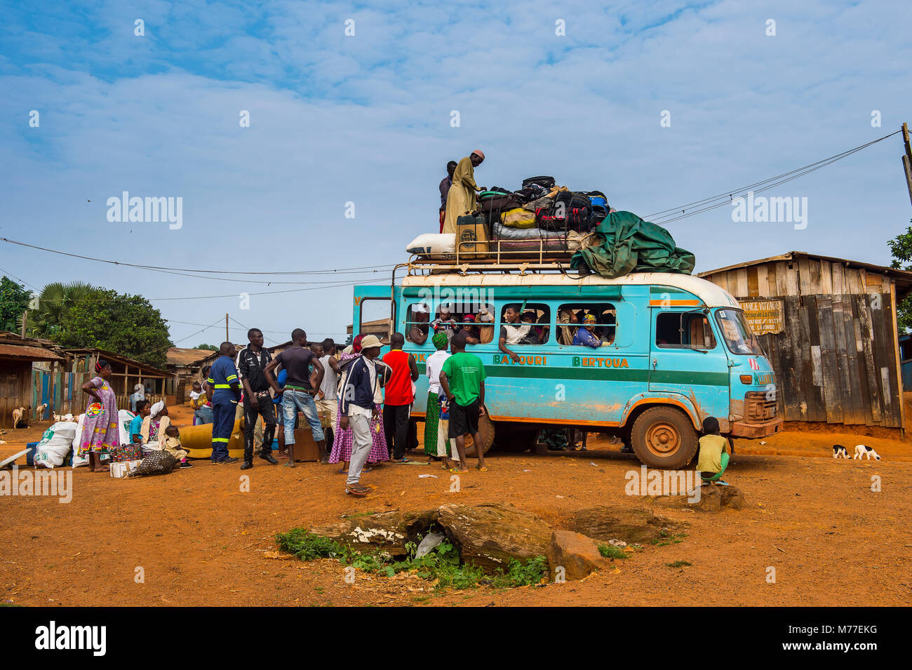 Fully loaded local bus in Libongo, deep in the jungle of Cameroon, Africa Stock Photo