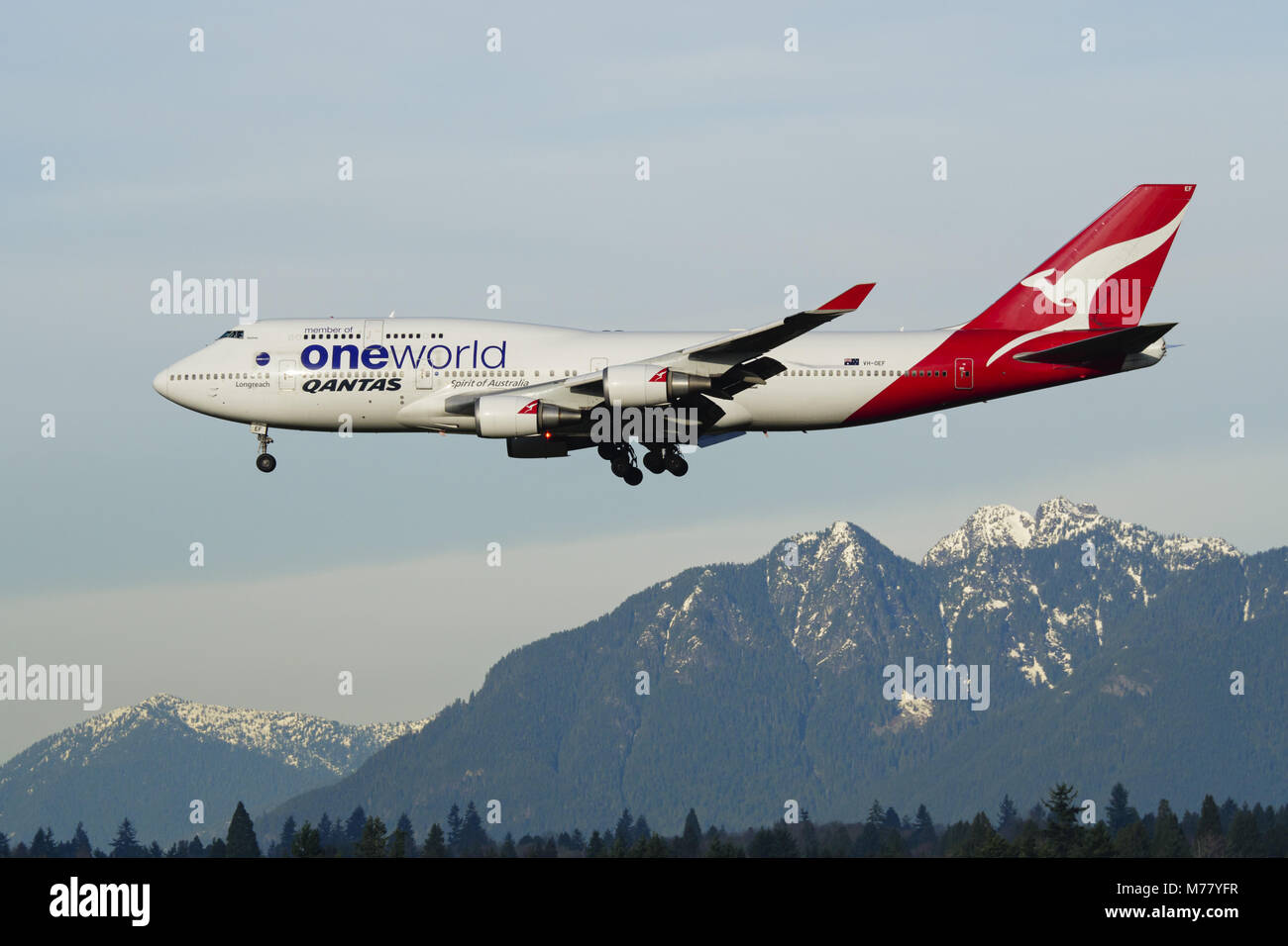 Richmond, British Columbia, Canada. 15th Jan, 2018. A Qantas Airways Boeing 747-400ER (VH-OEF) wide-body jumbo jet airliner, painted in special ''oneworld'' livery, on final approach for landing at Vancouver International Airport. Credit: Bayne Stanley/ZUMA Wire/Alamy Live News Stock Photo